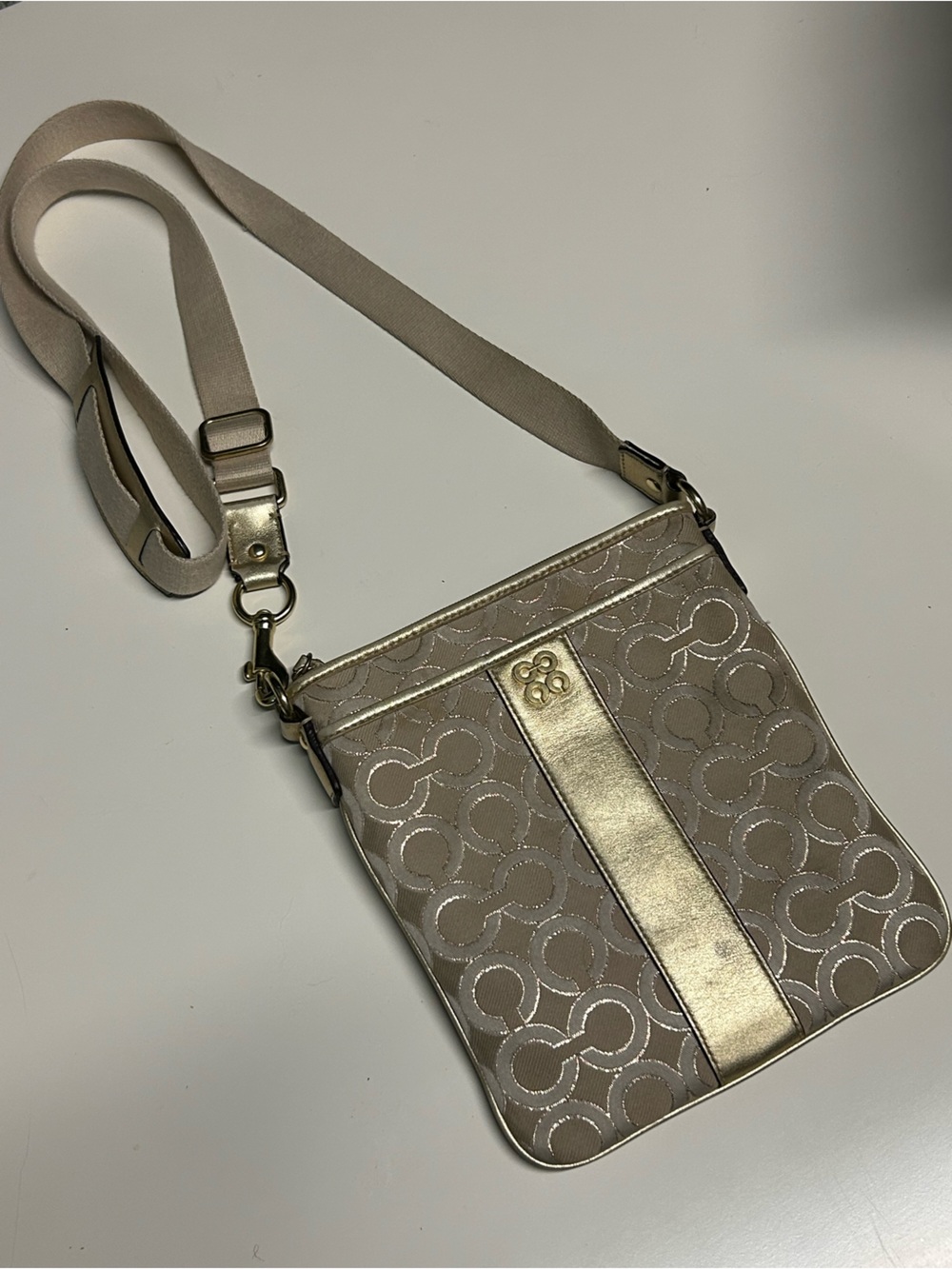 Coach Julia Signature C Metallic Gold Swingpack Crossbody Bag